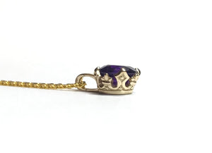Gold Crown and Stone Pendant
